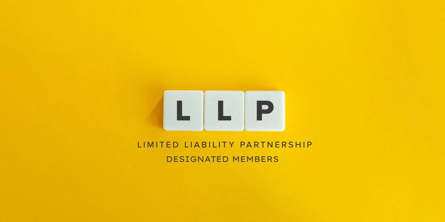 The letters LLP displayed on three white tiles with the sub-headings below of 'LIMITED LIABILITY PARTNERSHIP' and 'DESIGNATED MEMBERS' in dark grey font against a yellow background.